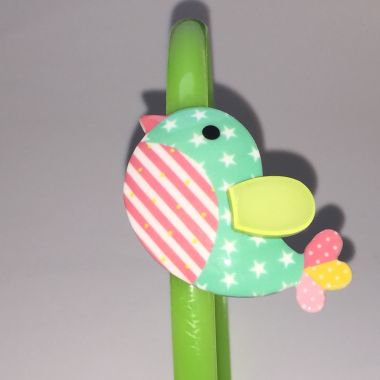 Head band with patterned bird shape