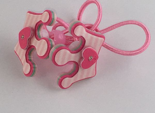 Elastics with crown shape