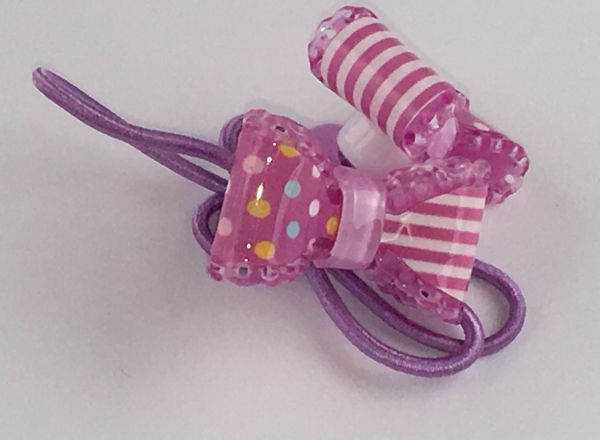 Elastics with patterned bow