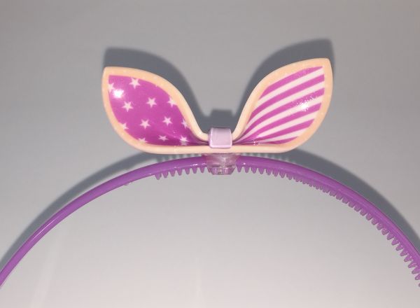 Head band with patterned bow