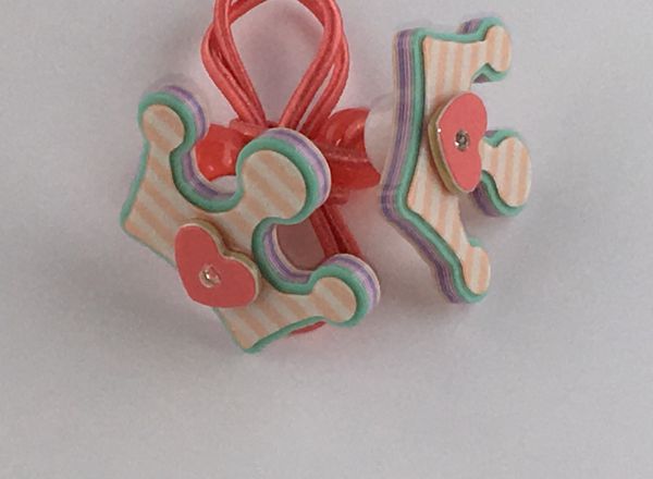 Elastics with crown shape